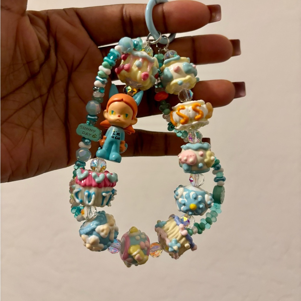 Colorful Beaded Bracelet with Figurine Charm